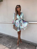 Vestido de manga larga con cuello en V y cintura ajustada
