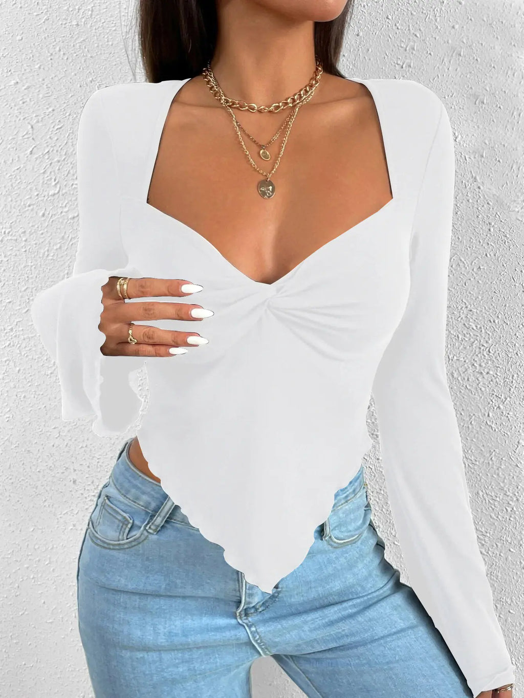 Camiseta de mujer de manga larga con cuello en V y punto irregular
