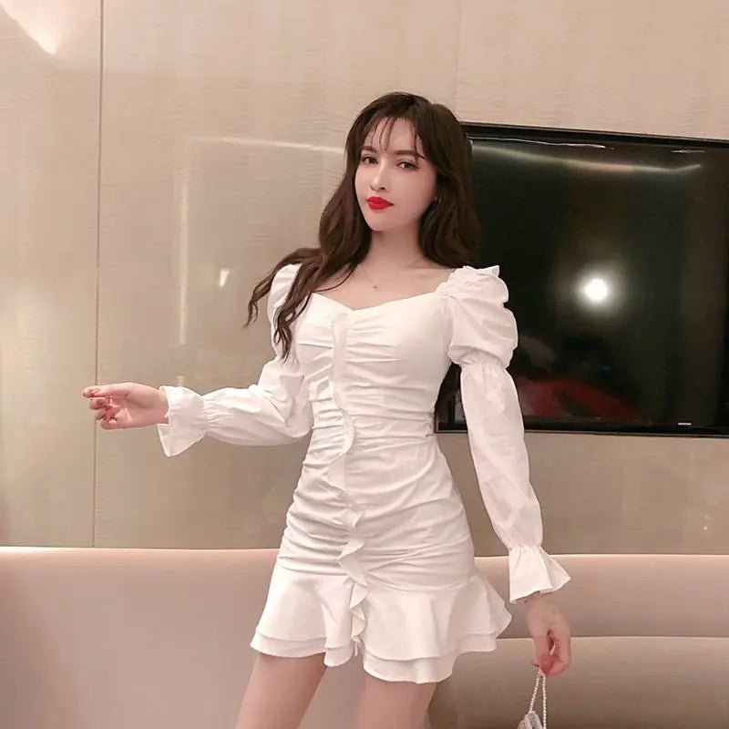 Vestido con hombros descubiertos, volante en el dobladillo y ajuste slim - Vant